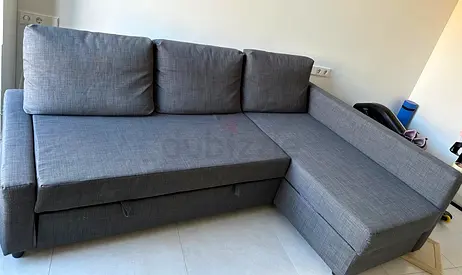 Grey L-shaped Sofa Bed with Storage — Good Condition
