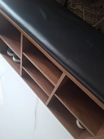 Wooden shoe storage with padded seat