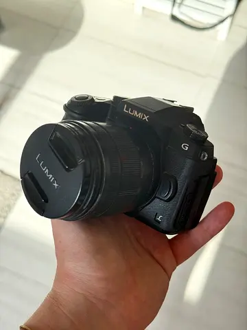 Panasonic Lumix G mirrorless camera with extra lens and batteries - used