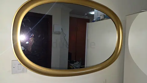 Gold oval wall mirror - medium size 95x60 cm