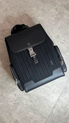 Rimowa Black Rimowa Backpack with Leather Flap and Side Pockets
