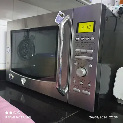 Used stainless steel microwave oven - working, good condition