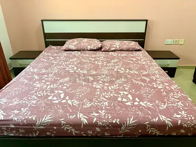 Queen size wooden bed with matching bedside tables - good condition