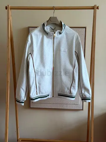 Louis Vuitton White perforated zip-up bomber jacket with green trim