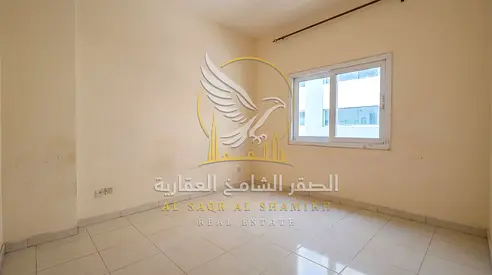One bedroom and living room for annual rent in Al Butina Sharjah Spacious area and central air conditioning