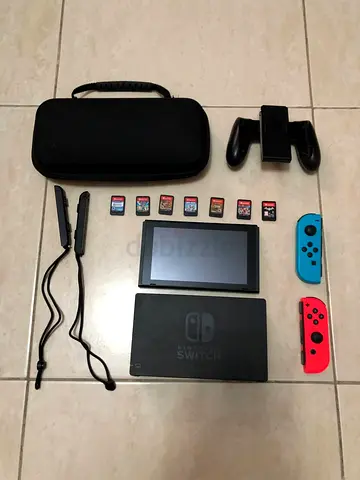 nintendo swich 1 with 7 games, a controler, a case and a tv dock (price negoatible)