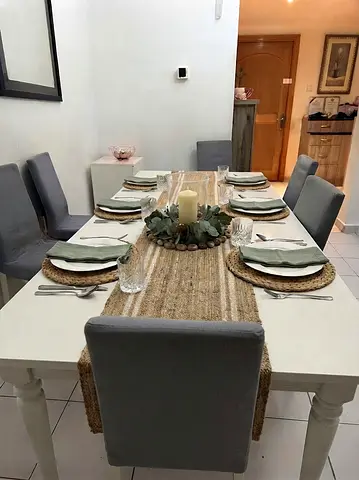 White Wooden Dining Table with free 6 Grey Slipcovered Chairs - Used