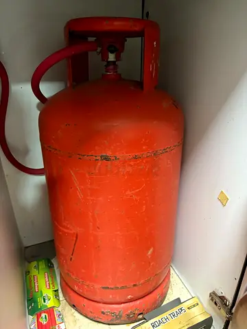 Used LPG Gas Cylinder (Red) - 25kg approx, good for home use
