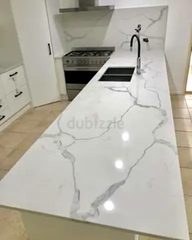 Modern Kitchen Countertop with Marble Finish, Sink and Cooking Area