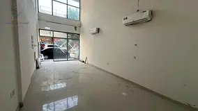 Commercial space for rent with mezzanine and split air conditioning.