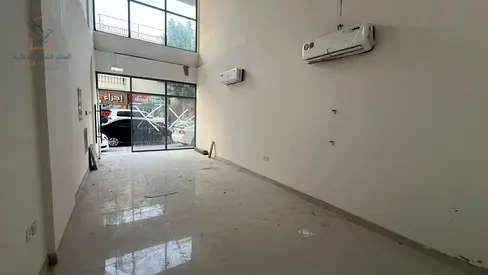 Commercial space for rent with mezzanine and split air conditioning.