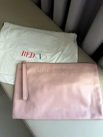 Pink REDValentino leather clutch with dust bag