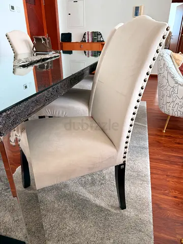 Beige Upholstered Dining Chairs with Nailhead Trim