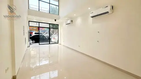 35 sqm commercial shop with mezzanine, approx. 450 sq ft. Prime location in Al Nuaimiya 2, near Kuwait St., opposite Al Nuaimiya Towers.