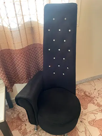 Black High-Back Accent Chair with Crystal Buttons and table