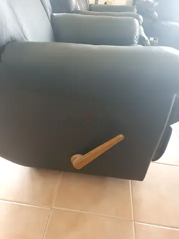 Dark black leather recliner sofa - single arm section