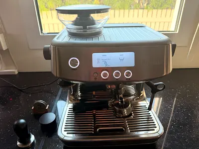 Breville espresso machine with built-in grinder — good working condition