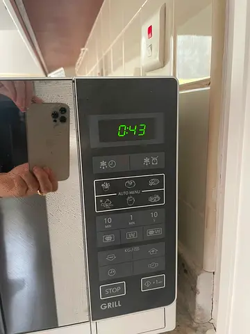 Used microwave oven with grill function - good working condition