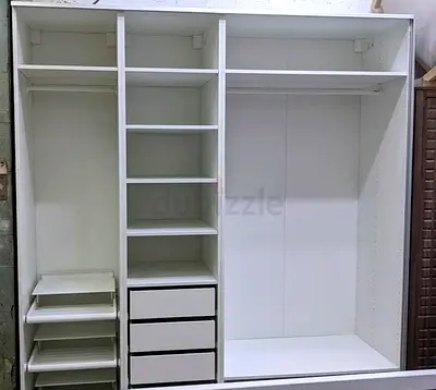 White Built-in Wardrobe / Closet Unit with Shelves and Drawers