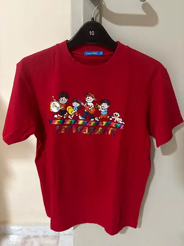 Red kids T-shirt with cartoon characters -