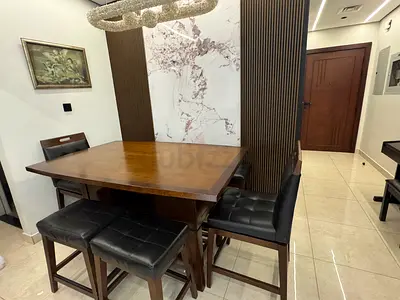 Wooden dining table with 6 chairs