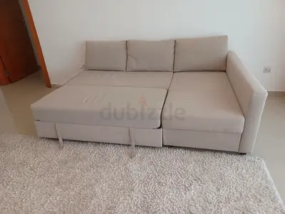 Light beige L-shaped sofa bed - good condition