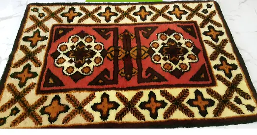 Used patterned wool-style rug - medium size, 120×80 cm good condition