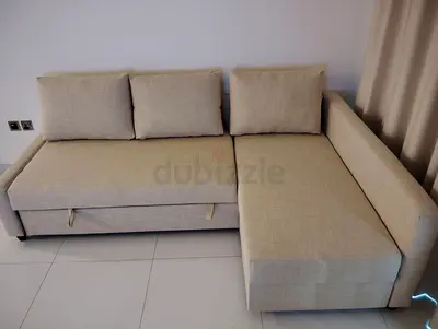 Beige L-shaped Sofa Bed (Good condition)
