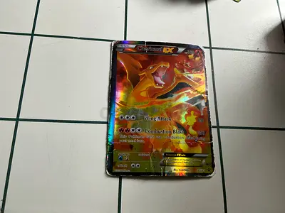 Very rare Charizard Pokemon card bad condition but very rare
