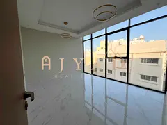 Annual rent: 2BR in Al Hamidiyah 1, balcony, central AC, 2 baths, easy payments, excellent finishing