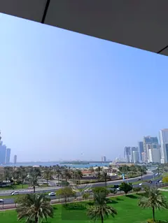 Annual rent in Al Majaz 2 two bedrooms and living room with direct views of the park and Al Majaz La