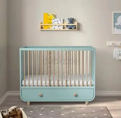 Convertible baby crib with under-drawer – light blue, good condition