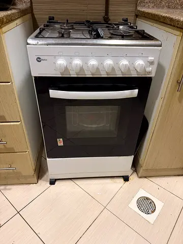 Used freestanding gas stove with oven - good working condition AED 150