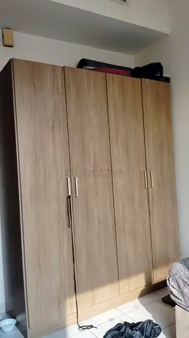 4-door wooden wardrobe in good condition - oak finish