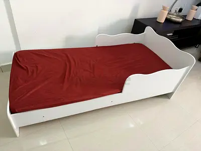 White Wooden Toddler Bed with Side Rails — with mattress