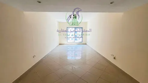 Spacious 2BR Apartment with Free AC & Balcony | Al Taawun