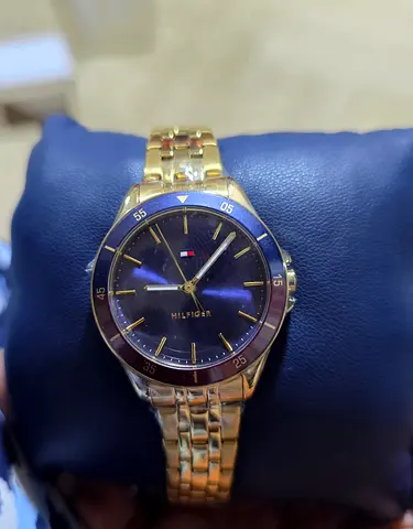 Never used , Brand New Tommy Hilfiger Gold Tone Women's Watch with Blue Dial with bill