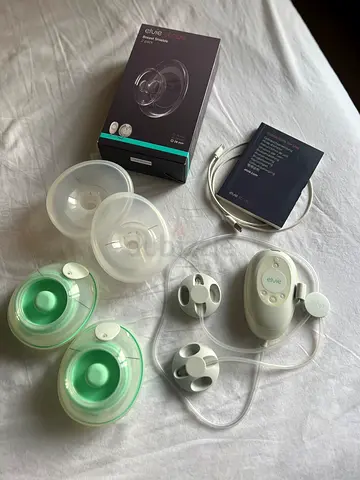 Elvie Stride Double Electric Breast Pump plus extra shields - excellent condition (in original box).