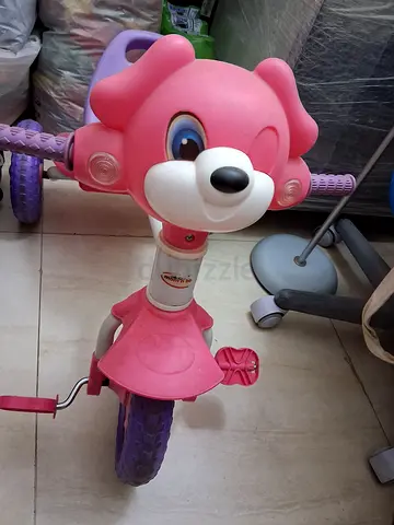 Pink toddler tricycle / ride-on in good used condition