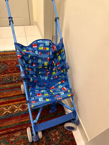 Lightweight blue umbrella stroller with vehicles print - excellent condition. Used only a few times.