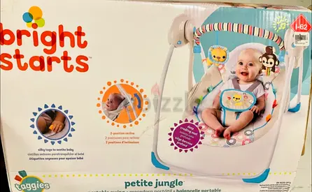 Baby rocker swing with music Used in good condition