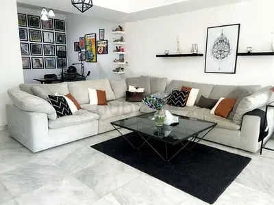Pan Emirates feather filled Sofa