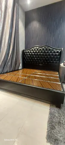 Queen size leather tufted bed frame with storage base - good condition