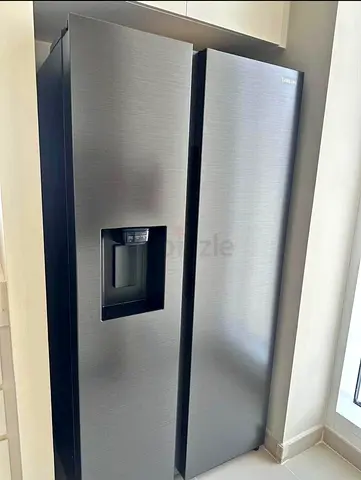 Samsung Side-by-Side Refrigerator with Water Dispenser -