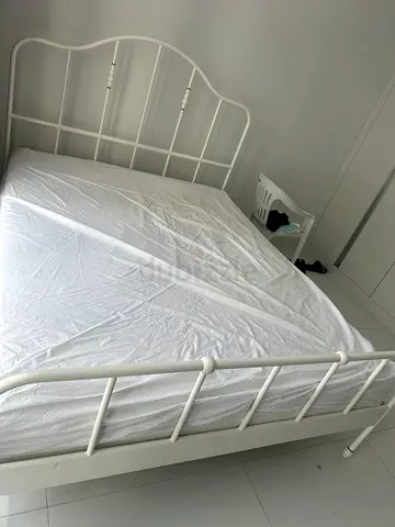 2 White metal single bed frame with headboard and footboard with Ikea Medicated mattress.