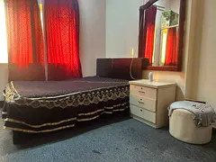 Fully furnished room is available for lady or family