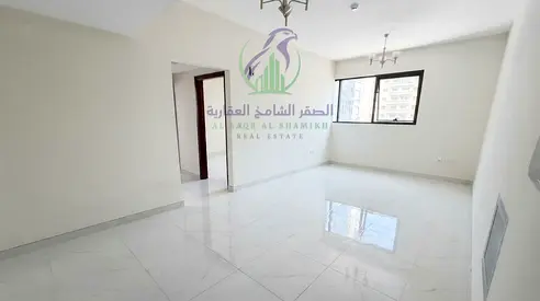 Brand-new 1-bedroom apartment in Al Mamzar, Sharjah, with 2 bathrooms, balcony, parking and modern