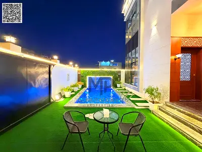 Luxury villa for sale in Al Amrah – Ajman | Two floors + roof, 6 master bedrooms with private pool,