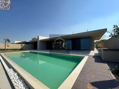 Villa for sale in Al-Zoura area, on the sea, surrounded by stunning natural beauty. Custom-finished and elegantly designed. Freehold ownership availa