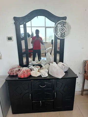 Black wooden dresser with mirror - good condition